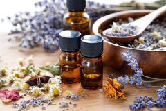 essential-oils-with-dried-herbs-74627804